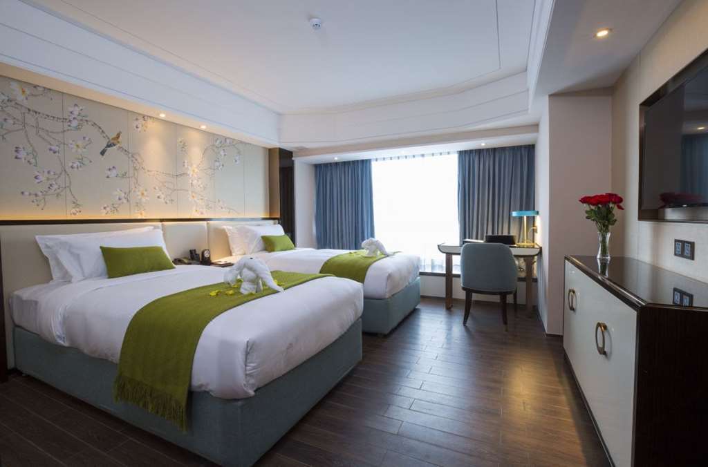 Clifford Suites Cantão Quarto foto